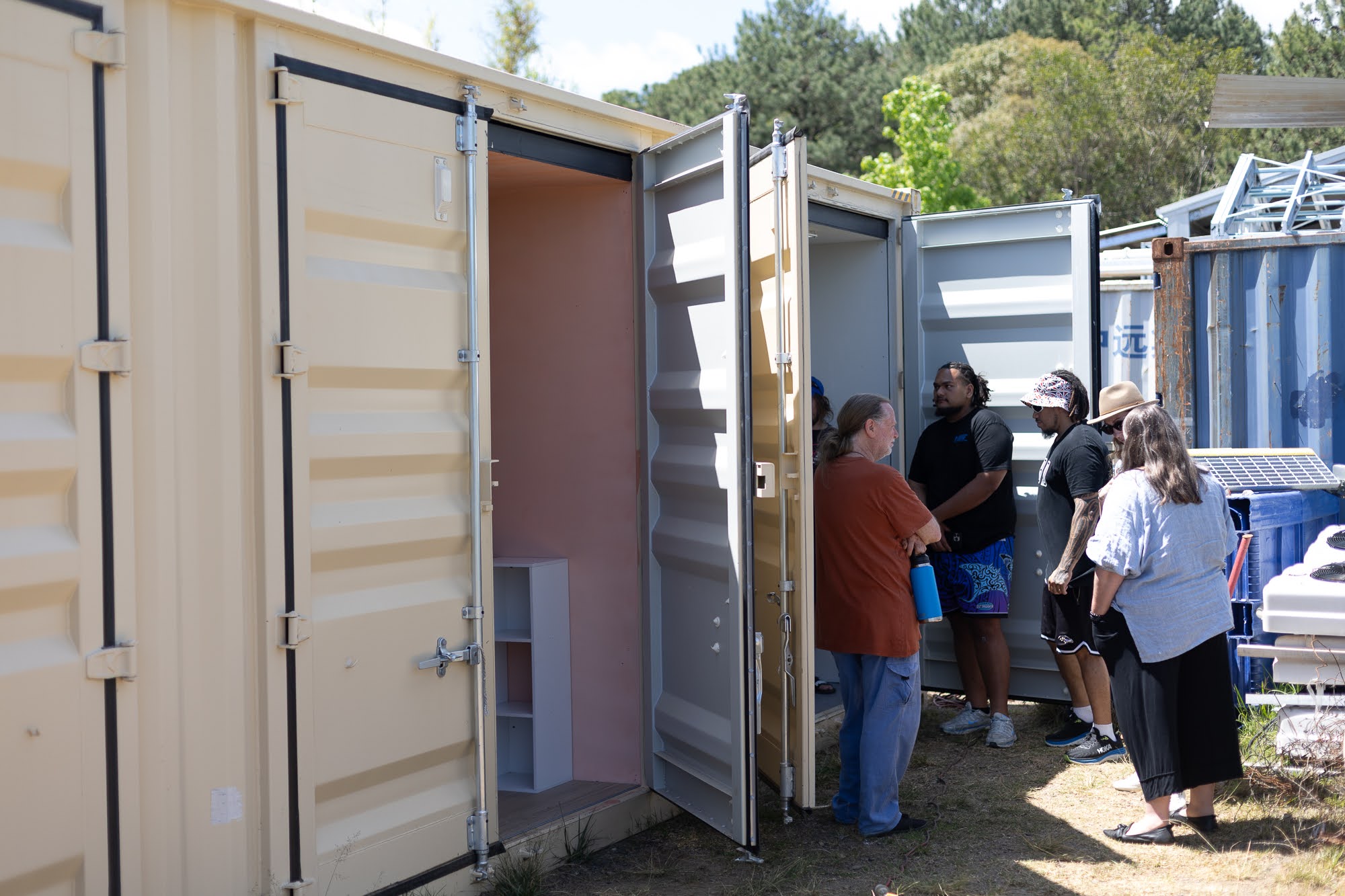 The CONTAINED installation — two rooms side by side